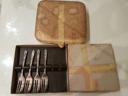 An Assortment of Silver Plated CoffeeSpoons and 4 Cake Forks: Emess Plate, Elwezetta Plateand epns