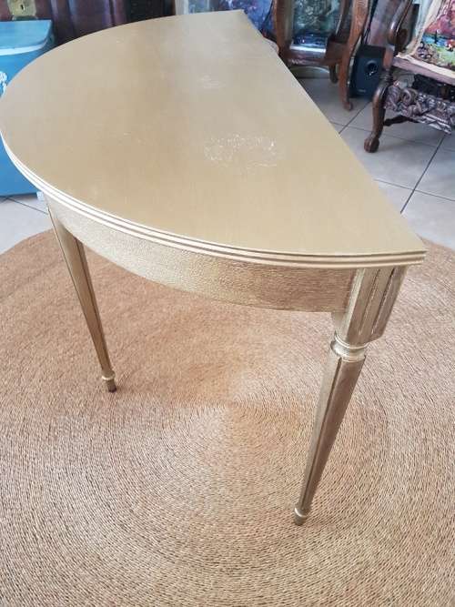 A Lovely Gilt Half Moon Table