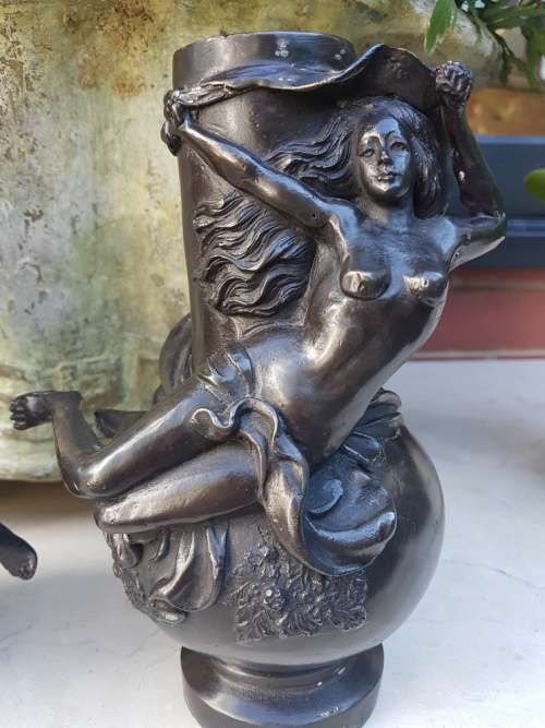 An outstanding Pair of Bronze Art Nouveau Candlestick Holders