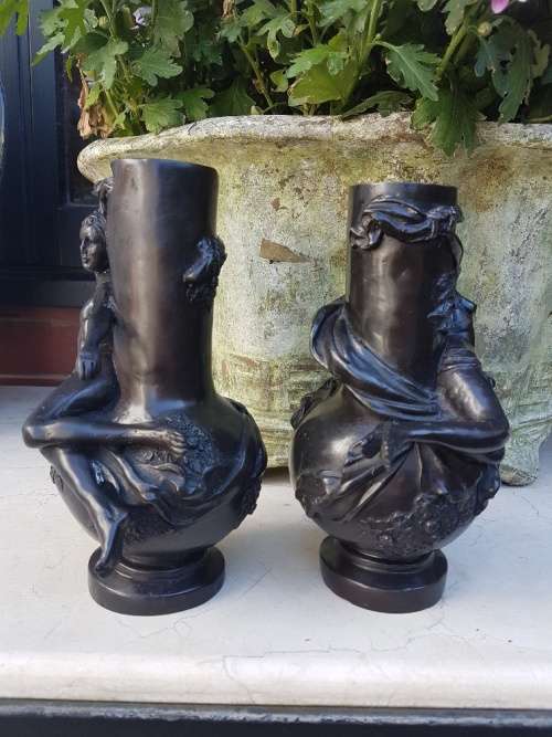 An outstanding Pair of Bronze Art Nouveau Candlestick Holders