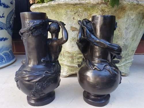 An outstanding Pair of Bronze Art Nouveau Candlestick Holders