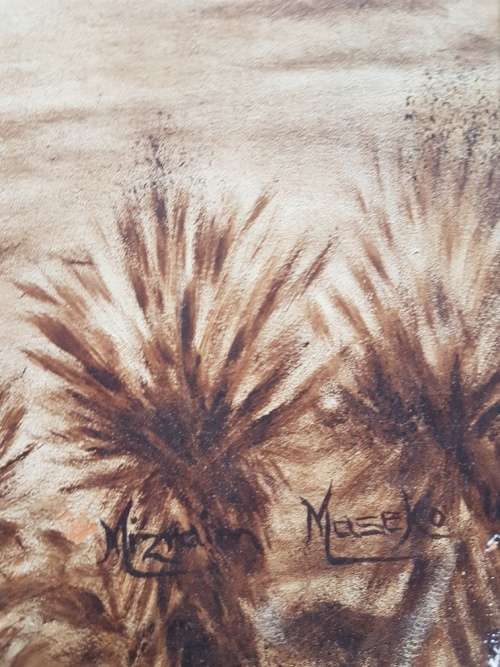 Mizraem Meseko(1927-1994)Oil on Hand tooled Leather Panel Charging Zulu Warrior