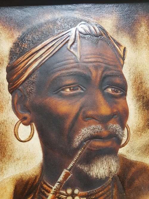 Mizraem Meseko(1927-1994)Oil on Hand tooled Leather Panel Man Smoking a Pipe