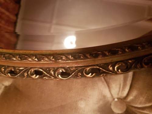 A Lovely Gilt Oval Beveled Mirror
