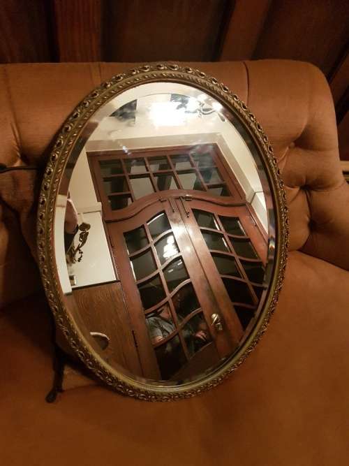 A Lovely Gilt Oval Beveled Mirror