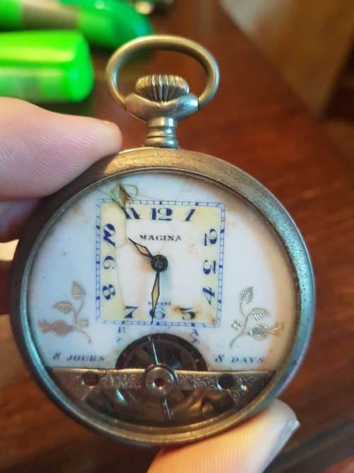 A Magina Swiss Made Pocket Watch( Not Working) in Grandfather Clock Holder