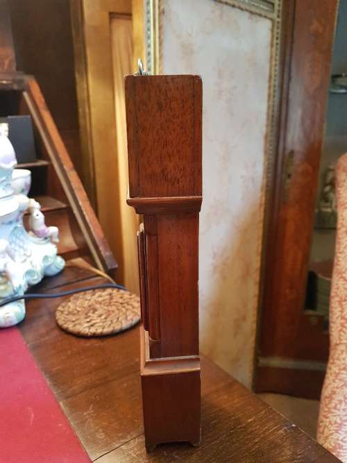 A Magina Swiss Made Pocket Watch( Not Working) in Grandfather Clock Holder