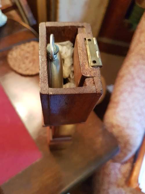 A Magina Swiss Made Pocket Watch( Not Working) in Grandfather Clock Holder