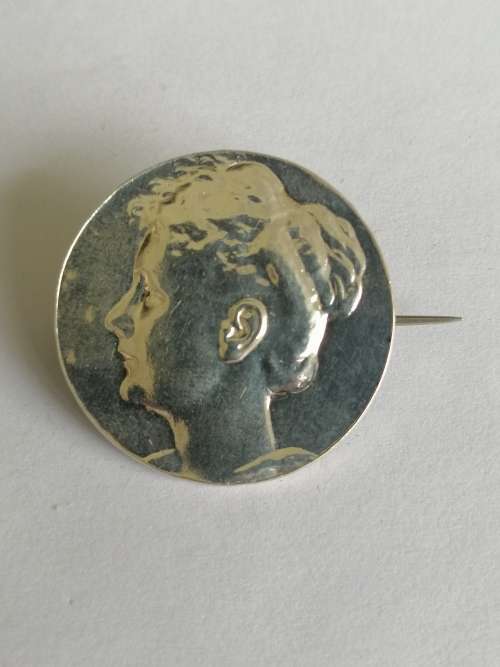 Silver Circular Brooch With a Lady`s Profile