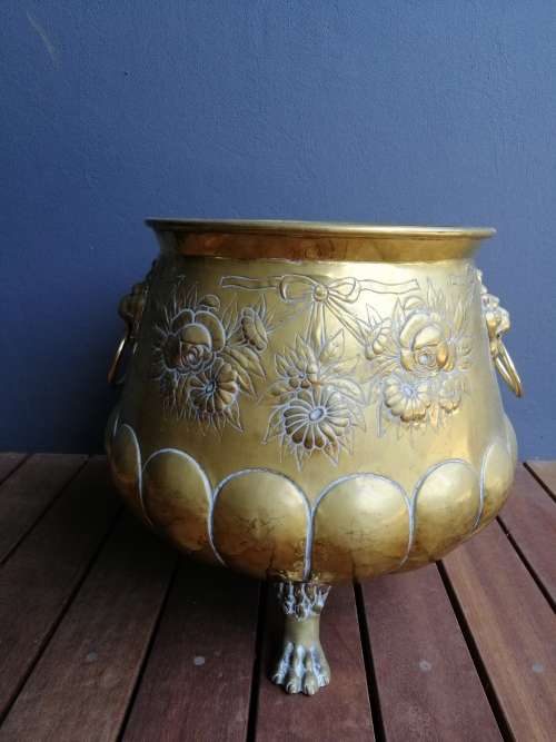 Striking English Brass Jardiniere With Embossed Detail And Robust Lion Ring Handles