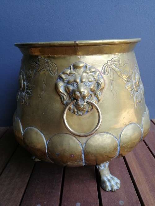 Striking English Brass Jardiniere With Embossed Detail And Robust Lion Ring Handles