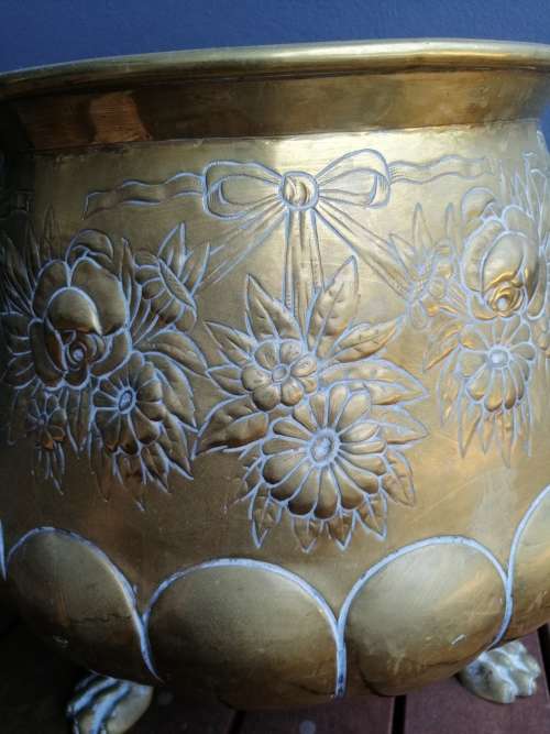 Striking English Brass Jardiniere With Embossed Detail And Robust Lion Ring Handles