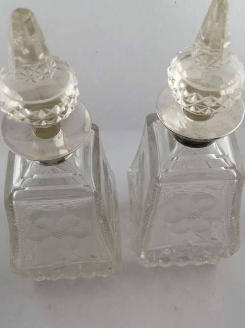 A Pair of Henry Perkins and Sons Silver Collared Scent Bottles