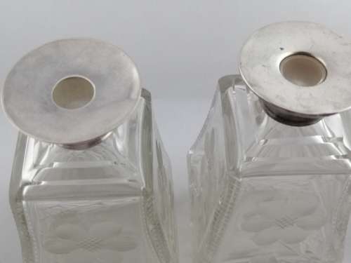 A Pair of Henry Perkins and Sons Silver Collared Scent Bottles