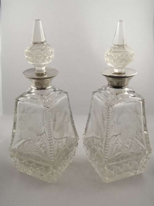 A Pair of Henry Perkins and Sons Silver Collared Scent Bottles