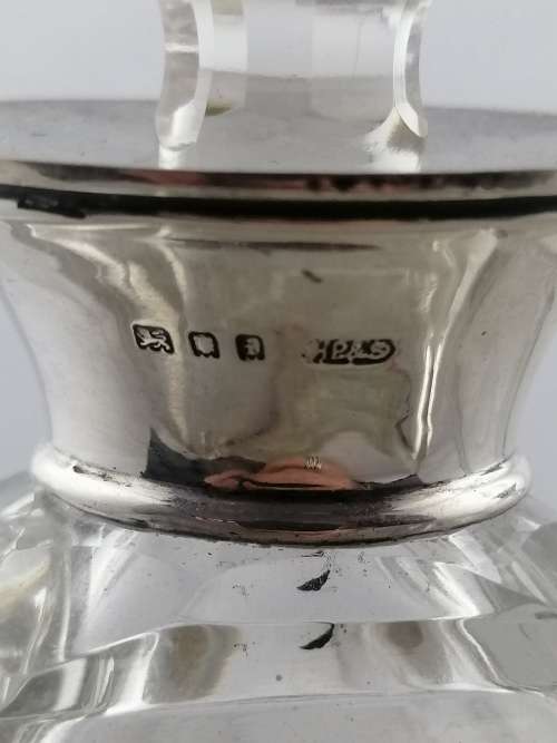 A Pair of Henry Perkins and Sons Silver Collared Scent Bottles