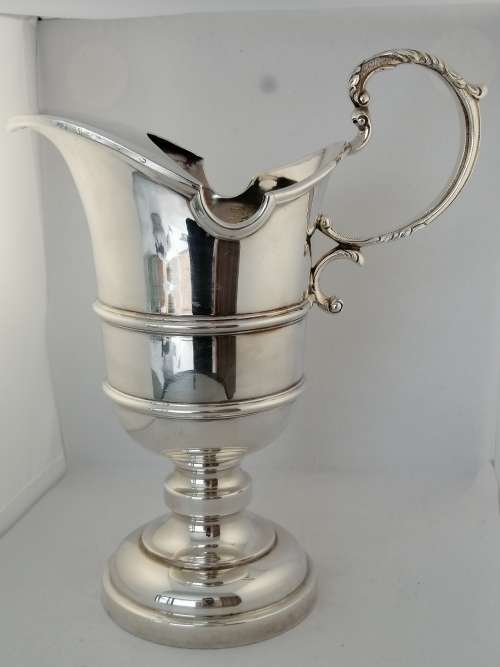 An Impressive Silver Plated Water Pitcher Grecian Urn