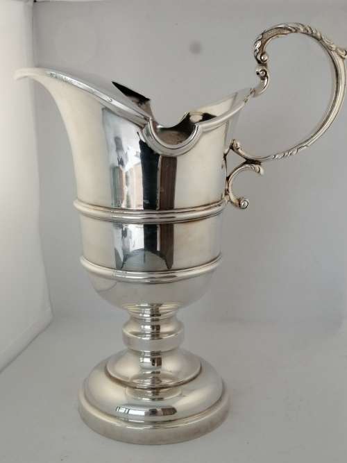 An Impressive Silver Plated Water Pitcher Grecian Urn