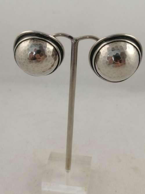 A Striking Pair of Hammered Silver Earrings