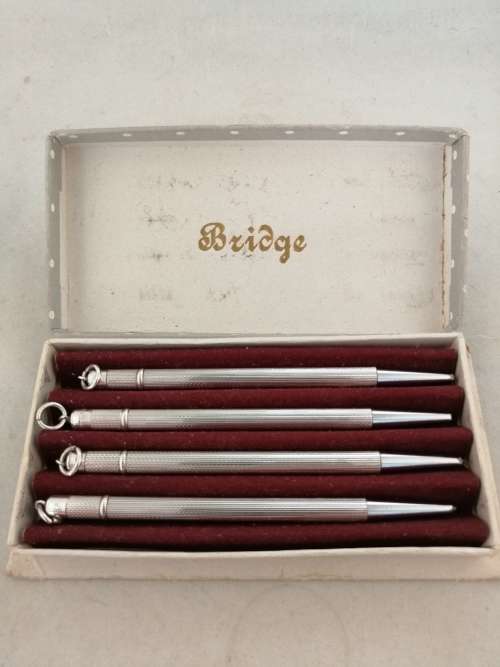 A Boxed Set of 4 Sterling Silver Bridge Pencils