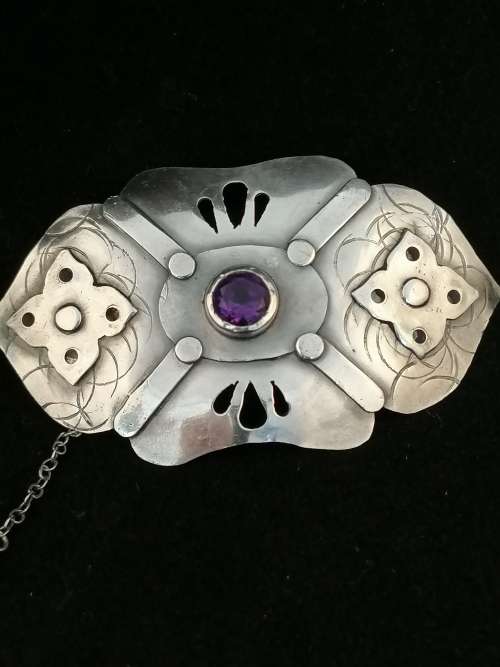 A Stunning Silver and Amethyst Arts and Crafts Brooch
