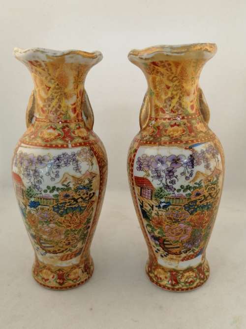 A  Pair of Oriental Style Vases