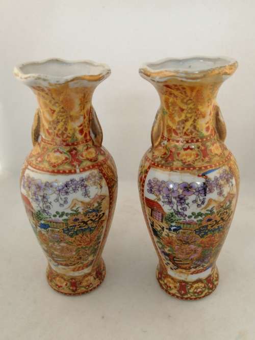 A  Pair of Oriental Style Vases