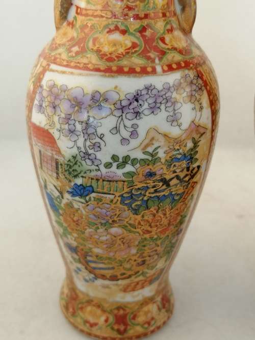 A  Pair of Oriental Style Vases