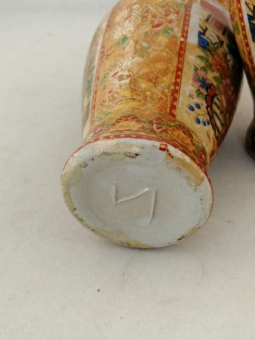 A  Pair of Oriental Style Vases