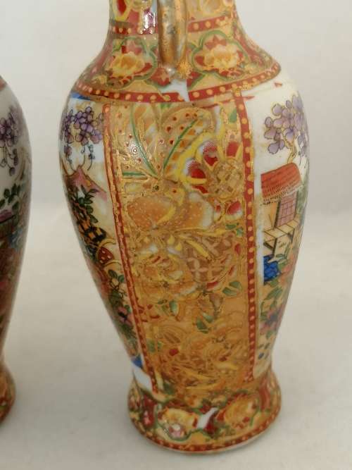 A  Pair of Oriental Style Vases
