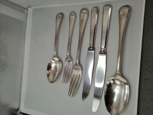 VINTAGE BOXED SILVER PLATED AND STAINLESS STEEL CUTLERY SET