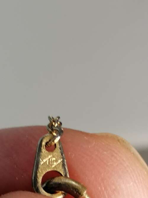A  BEAUTIFUL SMALL  GOLD PLATED BAR PENDANT WITH A CZ ON A MARKED CHAIN ,