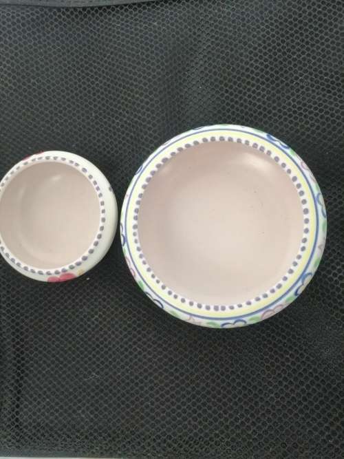 TWO POOLE TRINKET BOWLS ,ONE HAND DECORATED CICA 1952 AND THE OTHER SMALLER ONE CIRCA 1970