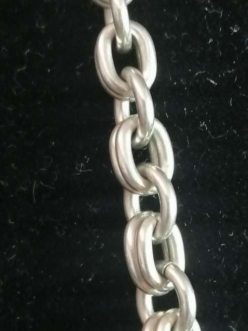 A STUNNING VINTAGE SWEDISH DESIGNER SILVER BOW NECKLACE
