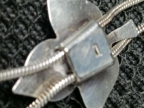 A PRETTY SILVERTONE?? CHAIN WITH AN ADJUSTABLE LEAF PENDANT