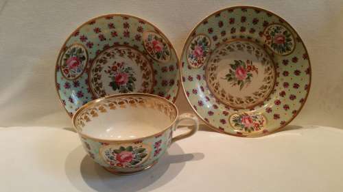An early 19th Century  Derby Cabinet cup saucer and side plate