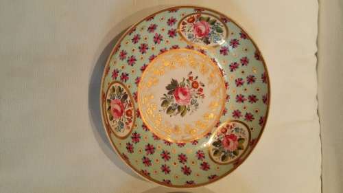 An early 19th Century  Derby Cabinet cup saucer and side plate