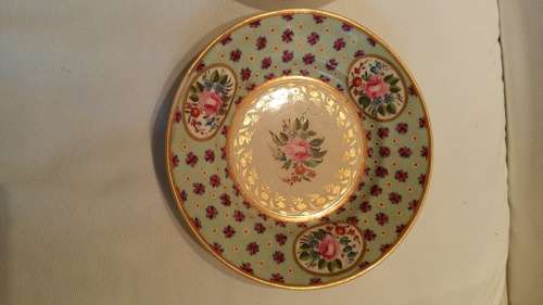 An early 19th Century  Derby Cabinet cup saucer and side plate