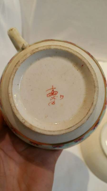 An early 19th Century  Derby Cabinet cup saucer and side plate