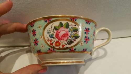 An early 19th Century  Derby Cabinet cup saucer and side plate