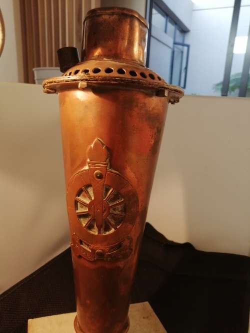 A copper Voortrekker oil lamp/ flame torch