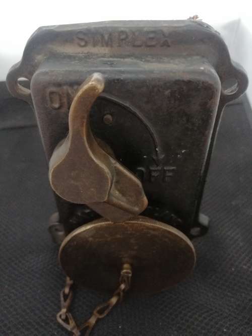 A VINTAGE BRASS SIMPLEX PLUG SWITCH