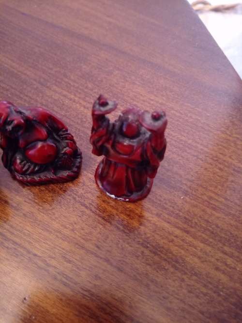 THREE VINTAGE MINATURE BUDDA RESIN FIGURINES