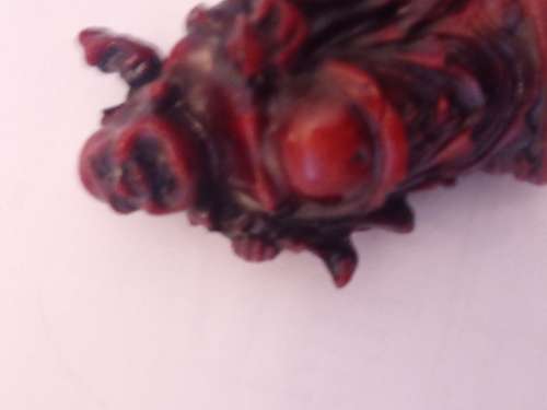 THREE VINTAGE MINATURE BUDDA RESIN FIGURINES