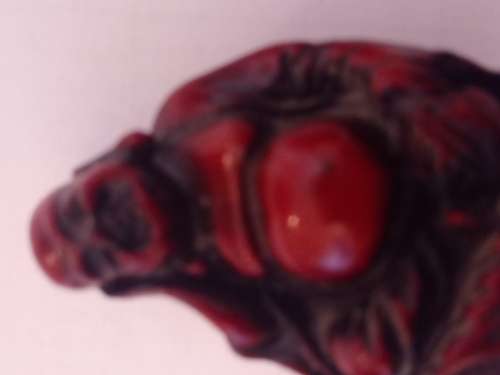 THREE VINTAGE MINATURE BUDDA RESIN FIGURINES