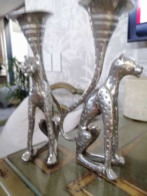 A Pair of Diana Carmichael Pewter medium size Cheetah Candlesticks