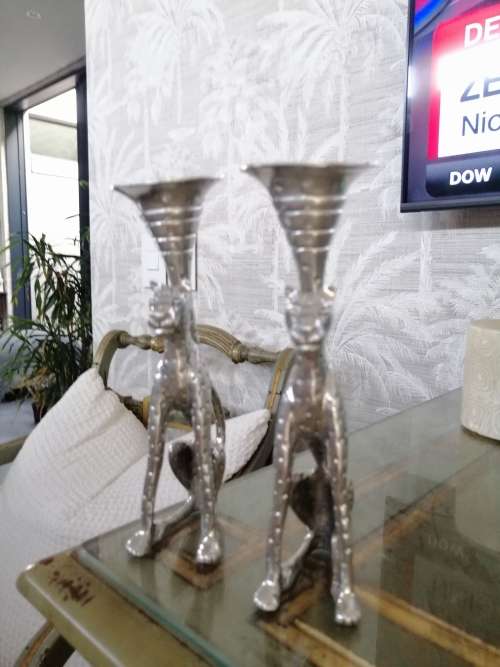 A Pair of Diana Carmichael Pewter medium size Cheetah Candlesticks
