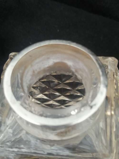 THREE CRYSTAL PERFUME BOTTLES WITH STERLING SILVER COLLAR`S