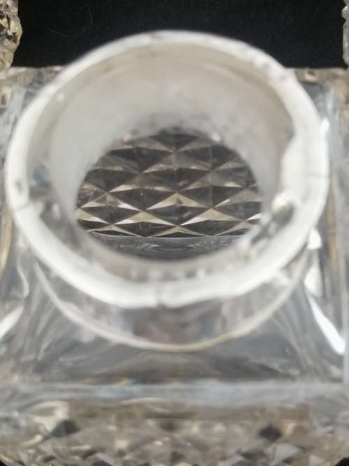 THREE CRYSTAL PERFUME BOTTLES WITH STERLING SILVER COLLAR`S