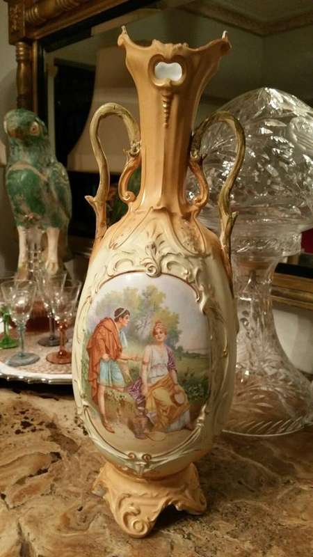 Royal Wettina Hand Painted Vase by Robert Hanke depicting two people talking in a gardenking by